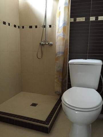 Фото номера Коттедж с 6 спальнями Дома для отпуска Twins Holiday Home г. Доспат 46