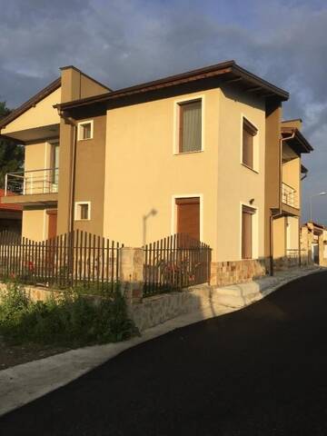 Фото номера Коттедж с 6 спальнями Дома для отпуска Twins Holiday Home г. Доспат 51