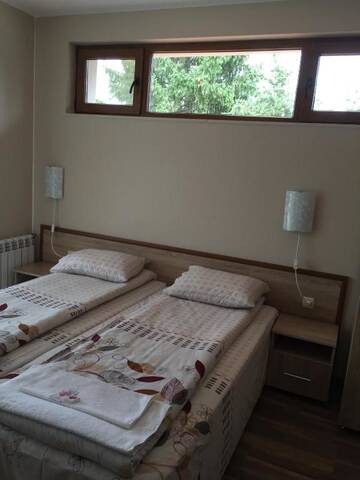 Фото номера Коттедж с 6 спальнями Дома для отпуска Twins Holiday Home г. Доспат 54