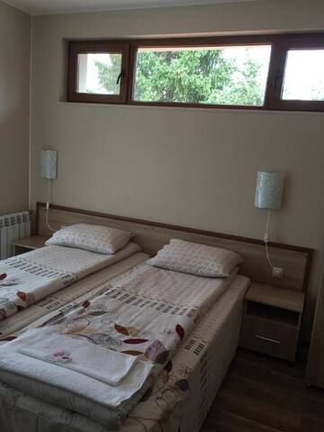 Фото номера Коттедж с 6 спальнями Дома для отпуска Twins Holiday Home г. Доспат 23