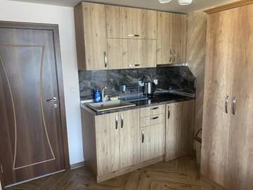 Фото номера Номер-студио с джакузи Апарт-отели Къщи за гости "Комплекс ОАЗИС" г. Доспат 7